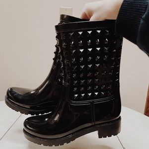 Black studded rain boots
